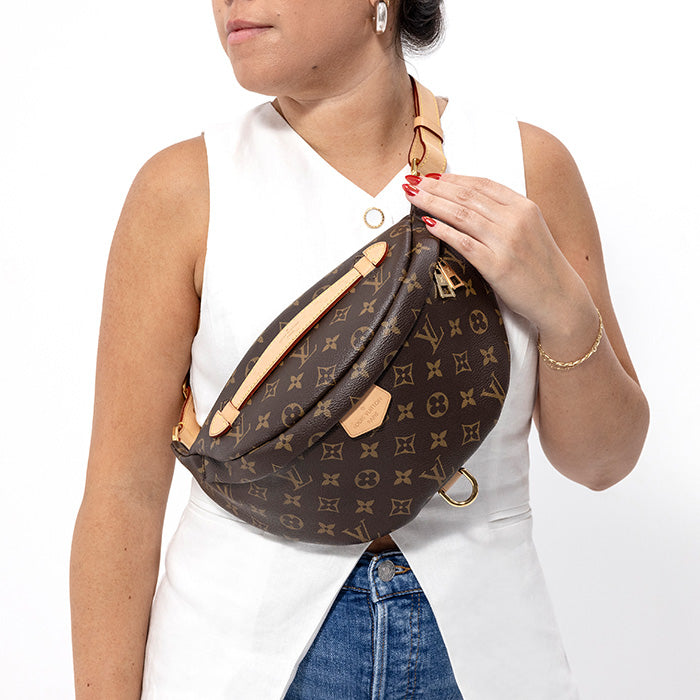 The original Louis Vuitton Monogram Bumbag worn as a crossbody bag by FASHIONPHILE