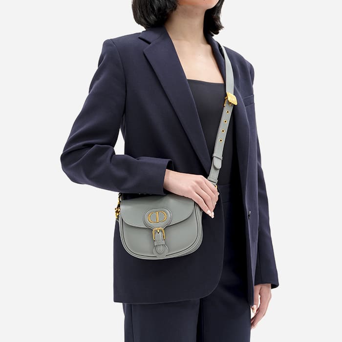 grey christian dior bobby bag worn as a crossbody by FASHIONPHILE