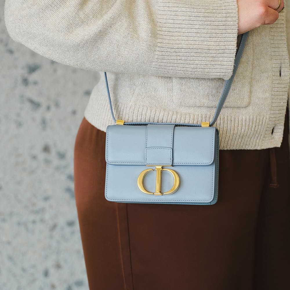 the micro dior 30 montaigne flap on-figure in the color blue by FASHIONPHILE