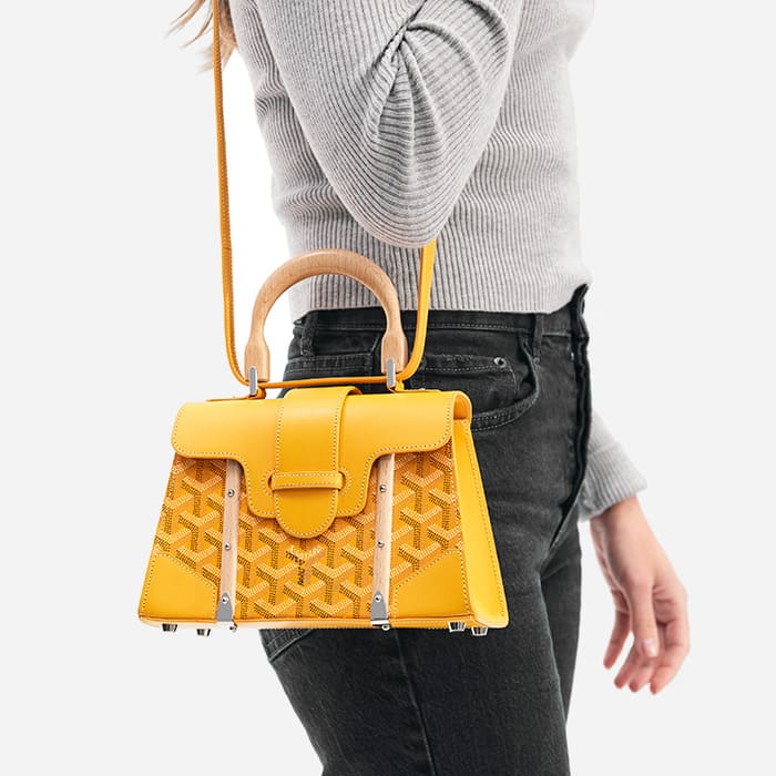 image of model wearing the mini structured goyard saigon bag as a shoulder bag by FASHIONPHILE