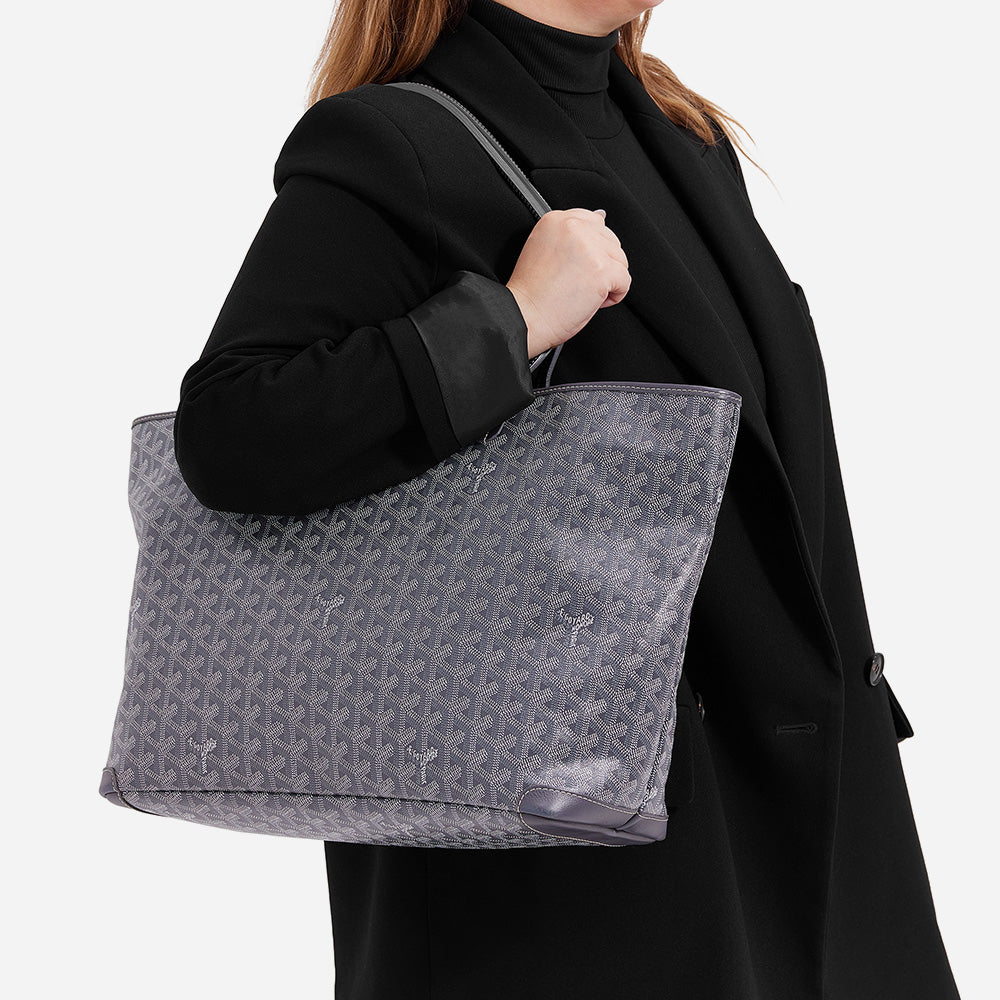model wearing the goyard artois mm tote on the shoulder in the grey by FASHIONPHILE