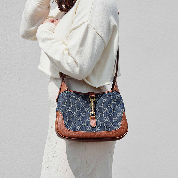 lifestyle image of model wearing the gucci small jackie 1961 hobo bag FASHIONPHILE