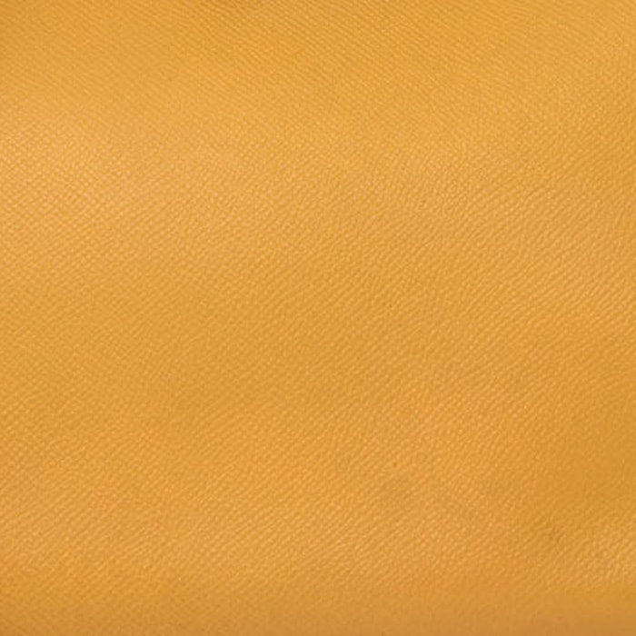 this is a close uo swatch image by fashionphile of the hermes jaune color on epsom leather