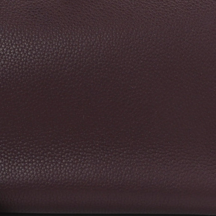 FASHIONPHILE color swatch of Hermes Prune in Taurillon Clemence