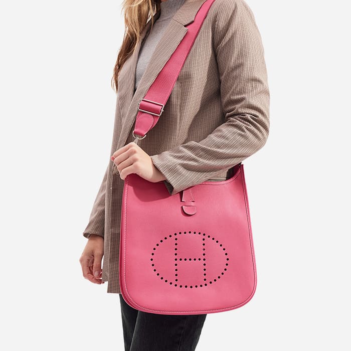 the hermes evelyne pm size worn as a shoulder bag by FASHIONPHILE