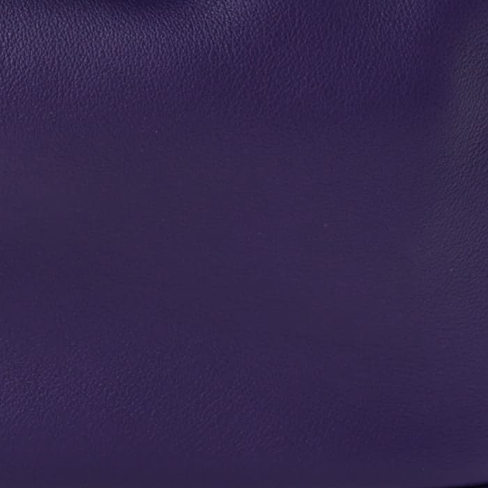 this is a close up swatch of hermes iris color on swift leather by FASHIONPHILE
