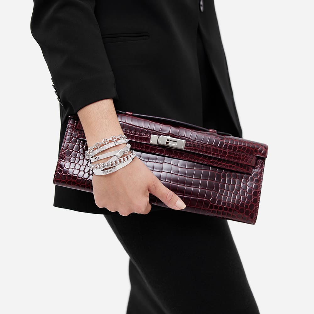 styling the crocodile hermes kelly cut clutch pochette in the color burgundy by FASHIONPHILE
