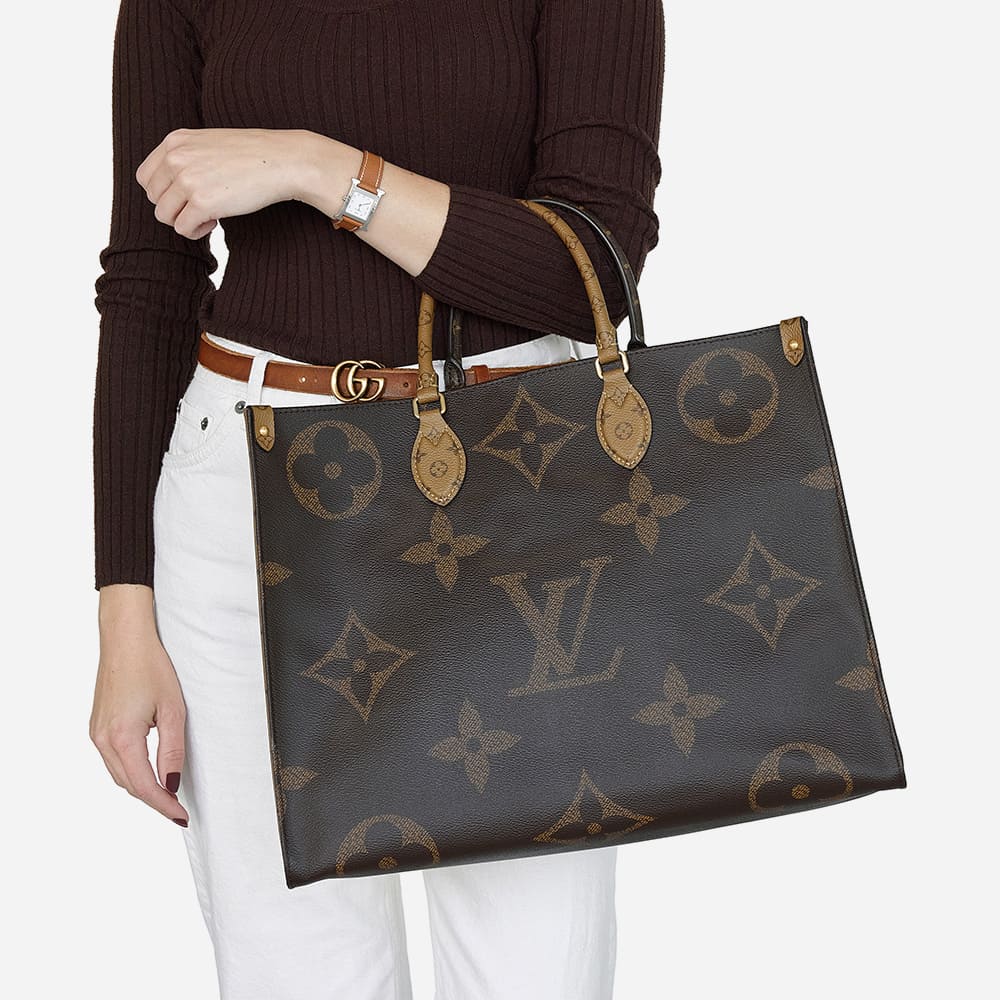 a classic giant monogram louis vuitton onthego tote in size gm styled on the arm by FASHIONPHILE