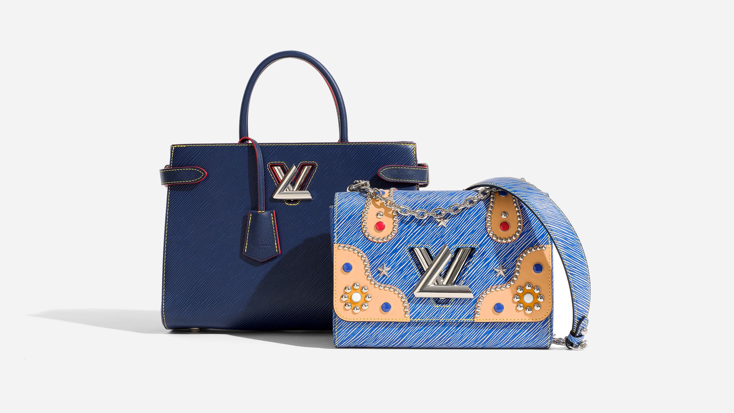 Different Louis Vuitton Twist handbags in the color blue by FASHIONPHILE