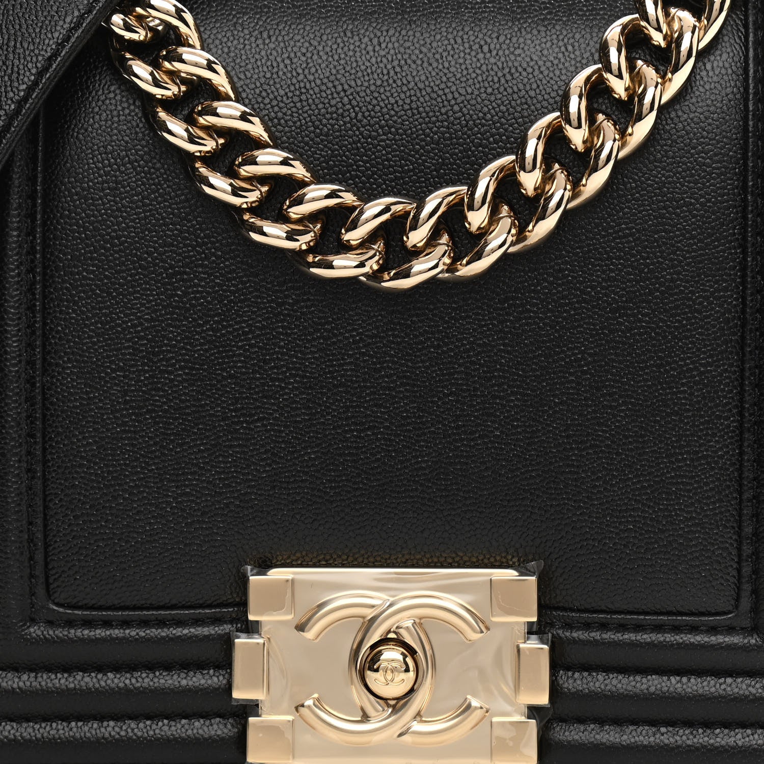 close up image of chanel light gold hardware FASHIONPHILE