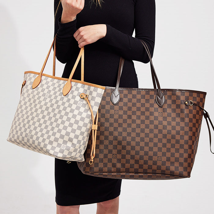 lifestyle image of louis vuitton neverfull mm tote and louis vuitton neverfull gm tote side by side FASHIONPHILE