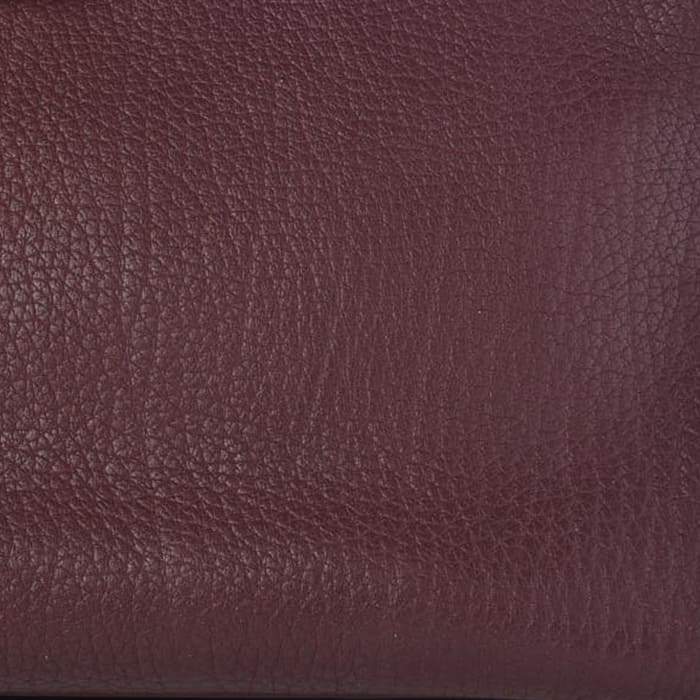 this is a close up swatch of hermes prune color on Fjord leather by FASHIONPHILE