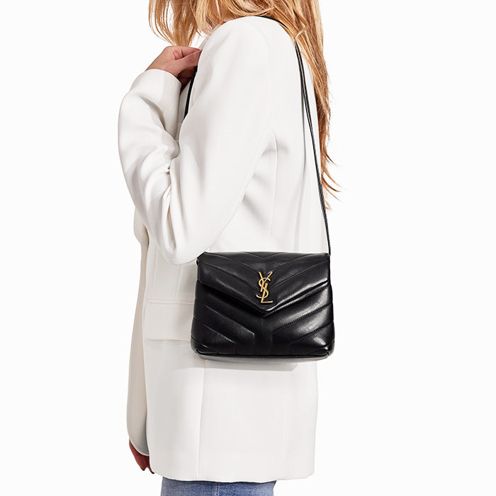 studio image of model wearing saint laurent toy loulou bag FASHIONPHILE