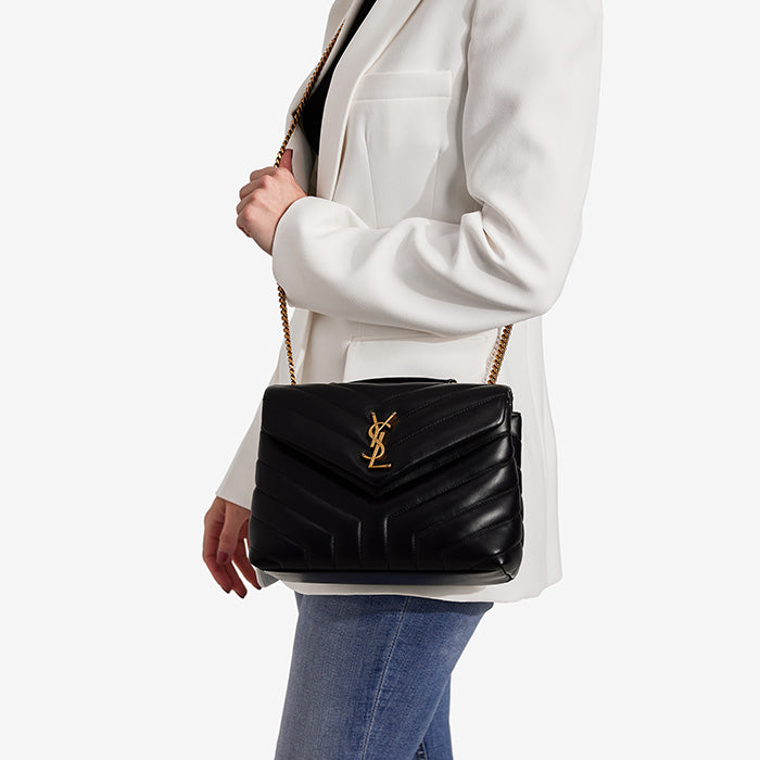 studio image of model wearing saint laurent small loulou bag FASHIONPHILE