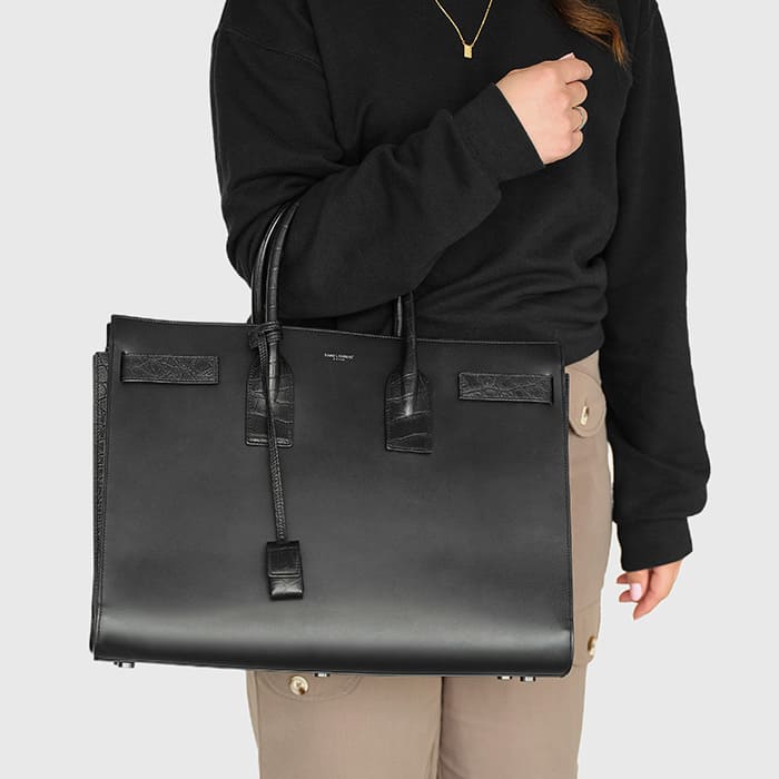 black leather large sac de jour styled on the arm by FASHIONPHILE