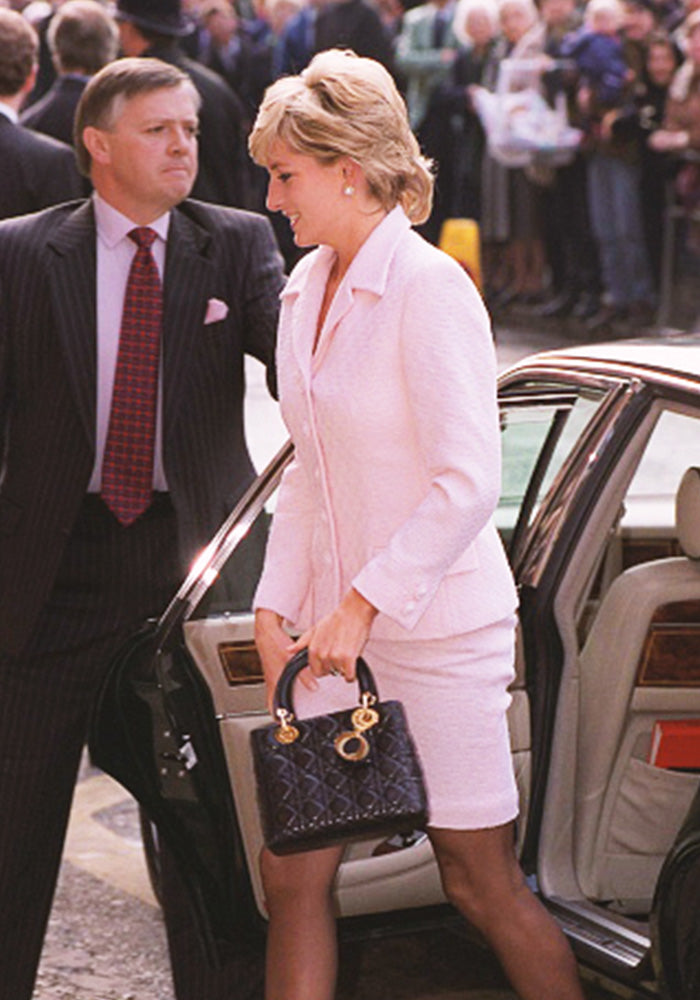 image of Princess Diana carrying her Christian Dior Lady Dior bag FASHIONPHILE