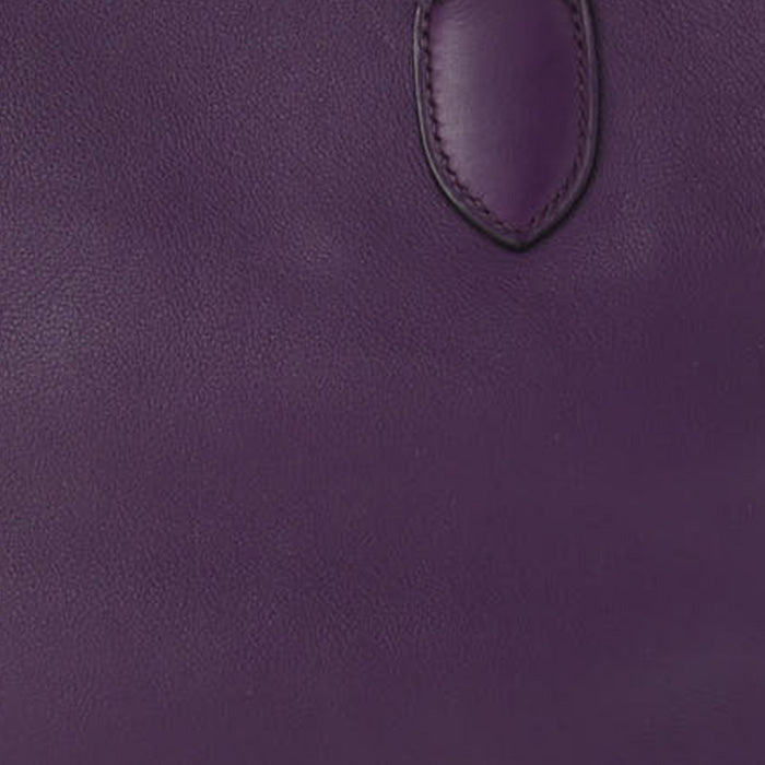 this is a close up swatch image of hermes ultraviolet color on swift leather by FASHIONPHILE