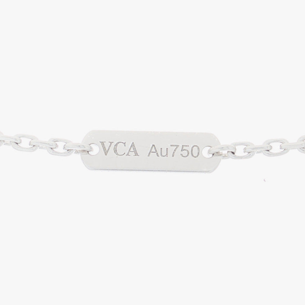 image of authentic van cleef & arpels hallmark engraving that reads VCA Au750 by FASHIONPHILE