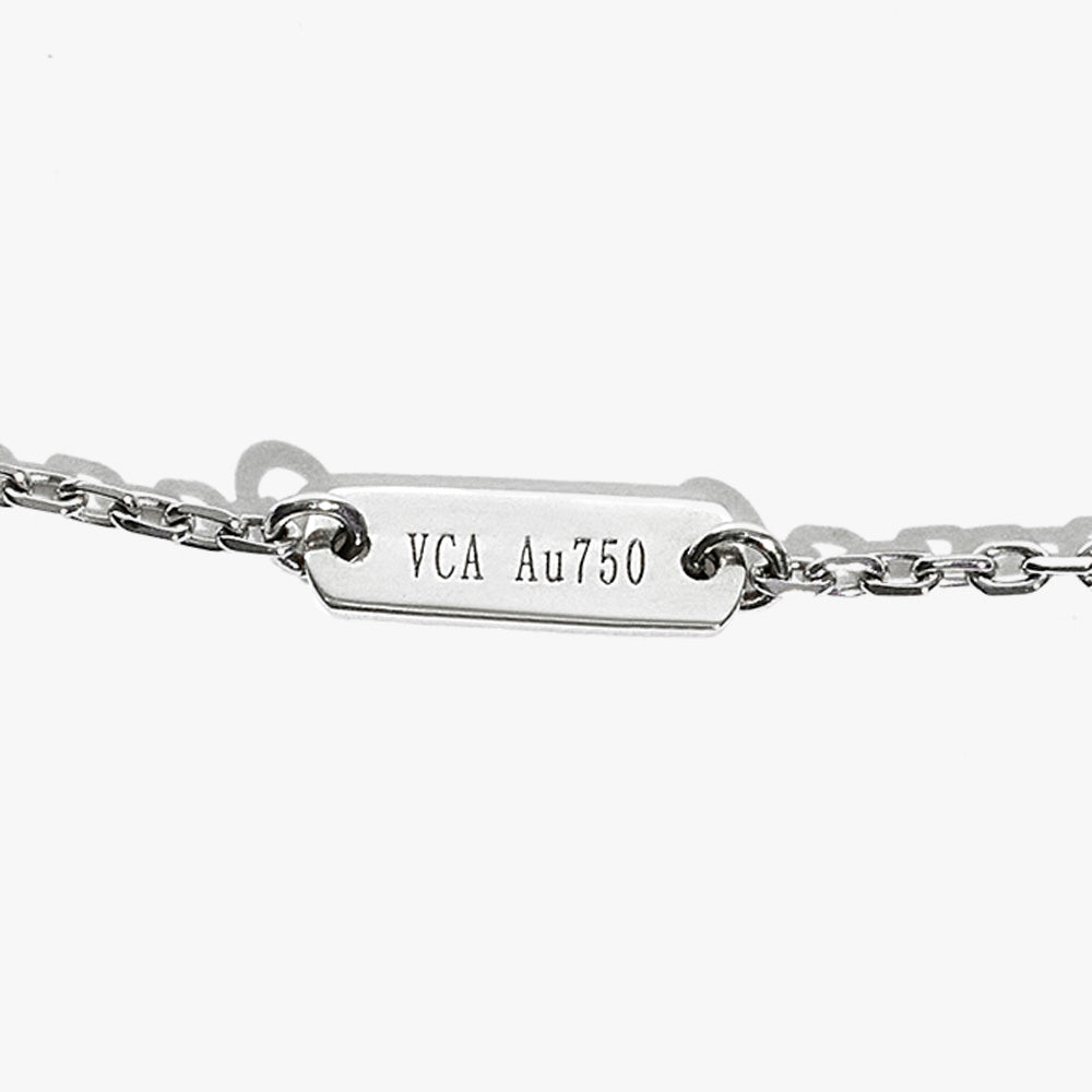 image of fake van cleef & arpels hallmark engraving that reads VCA Au750 by FASHIONPHILE