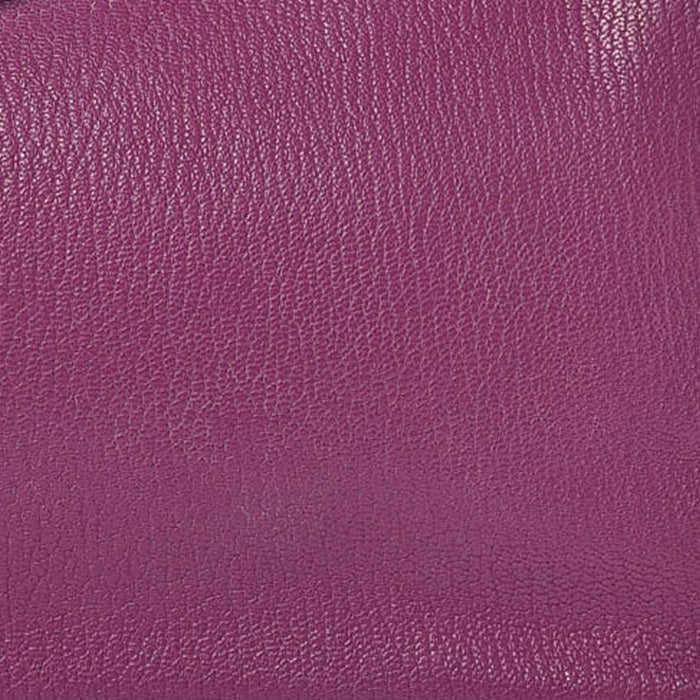 this is a close up swatch image of hermes violet color on chevre mysore leather by FASHIONPHILE
