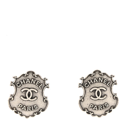 Chanel Metal Paris Dallas Sheriff Badge Stud Earrings Silver 1 of 4