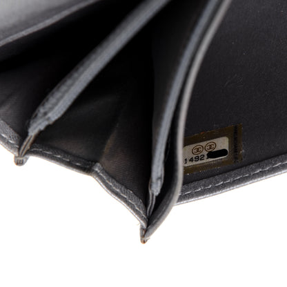 Chanel Lambskin Camellia Embossed Yen Wallet Black 8 of 26