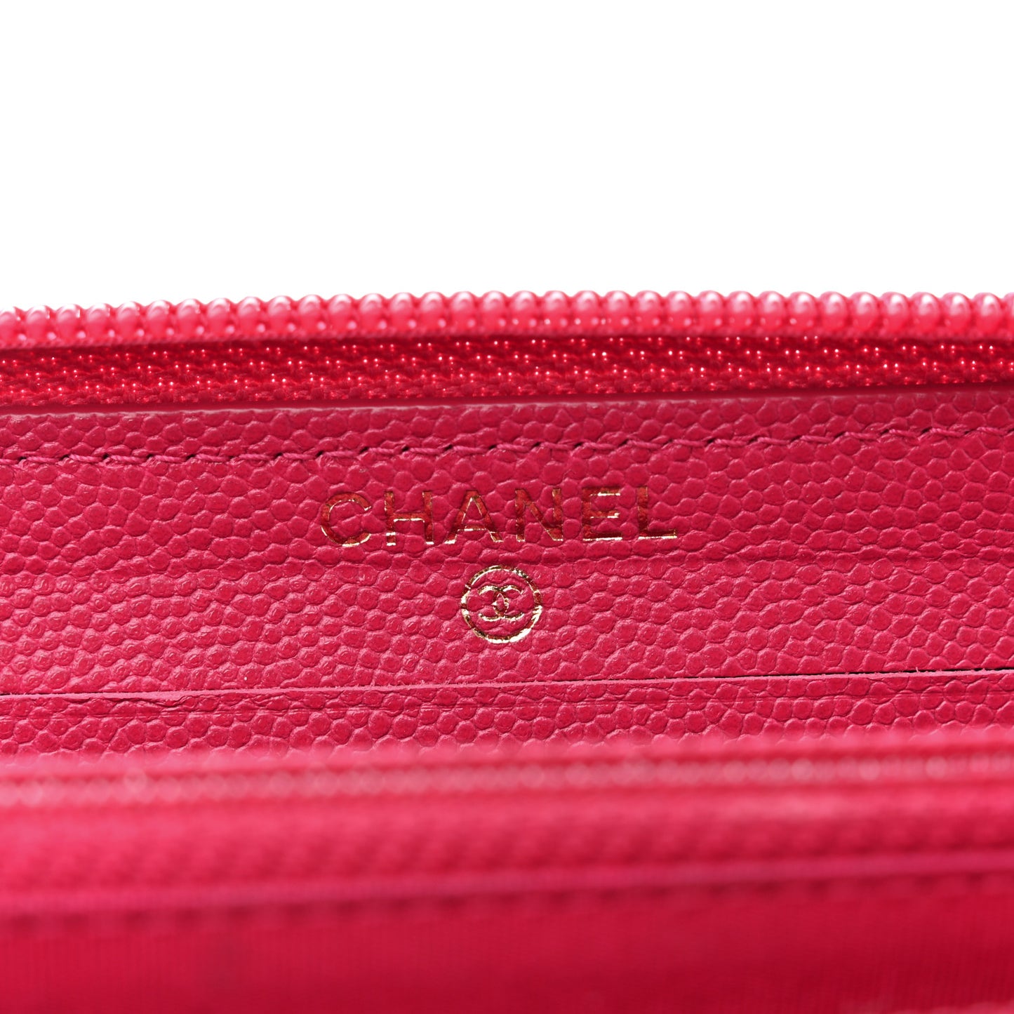 Caviar Quilted Small Boy Zip Around Wallet Fuchsia