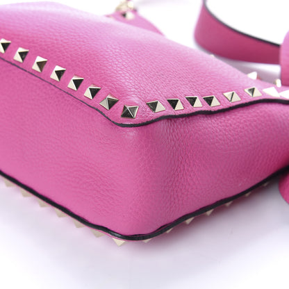 Valentino Garavani Pebbled Calfskin Mini Rockstud Flip-Lock Messenger Bag Pink Orchid 9 of 9