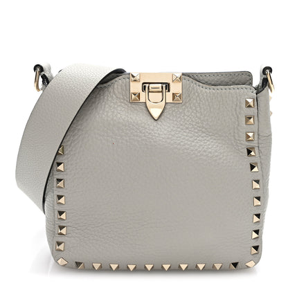Valentino Garavani Pebbled Calfskin Mini Rockstud Flip-Lock Messenger Bag Pastel Grey 1 of 9