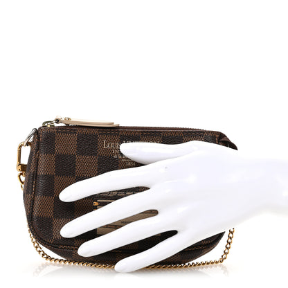 Louis Vuitton Damier Ebene Trunks and Locks Mini Pochette Accessories 2 of 9