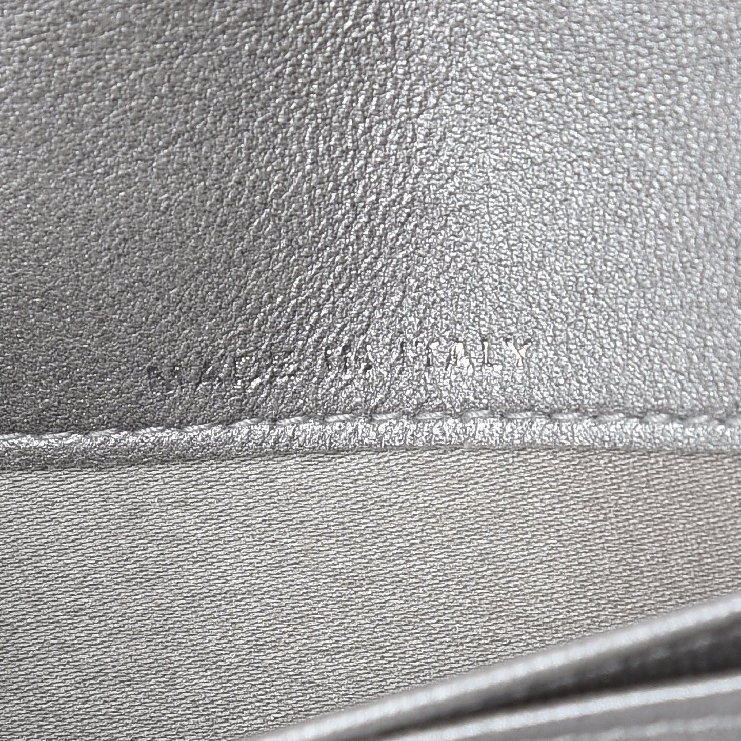 Lambskin Camellia Embossed Yen Wallet Black
