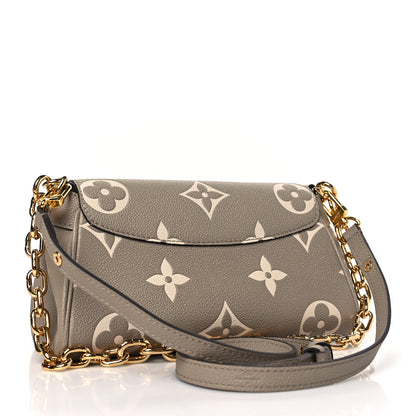 Louis Vuitton Empreinte Monogram Giant Favorite Tourterelle Creme 3 of 9