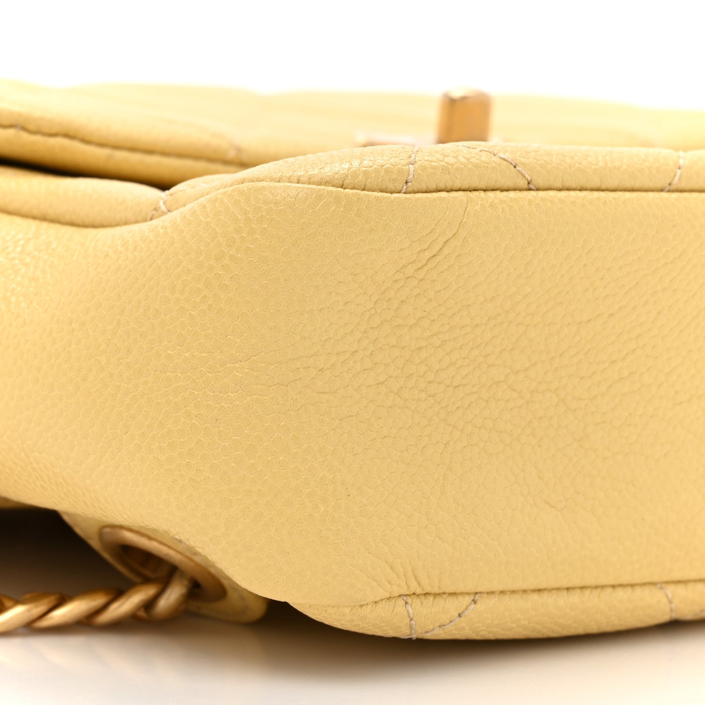 Shiny Caviar Quilted Chain Melody Backpack Yellow