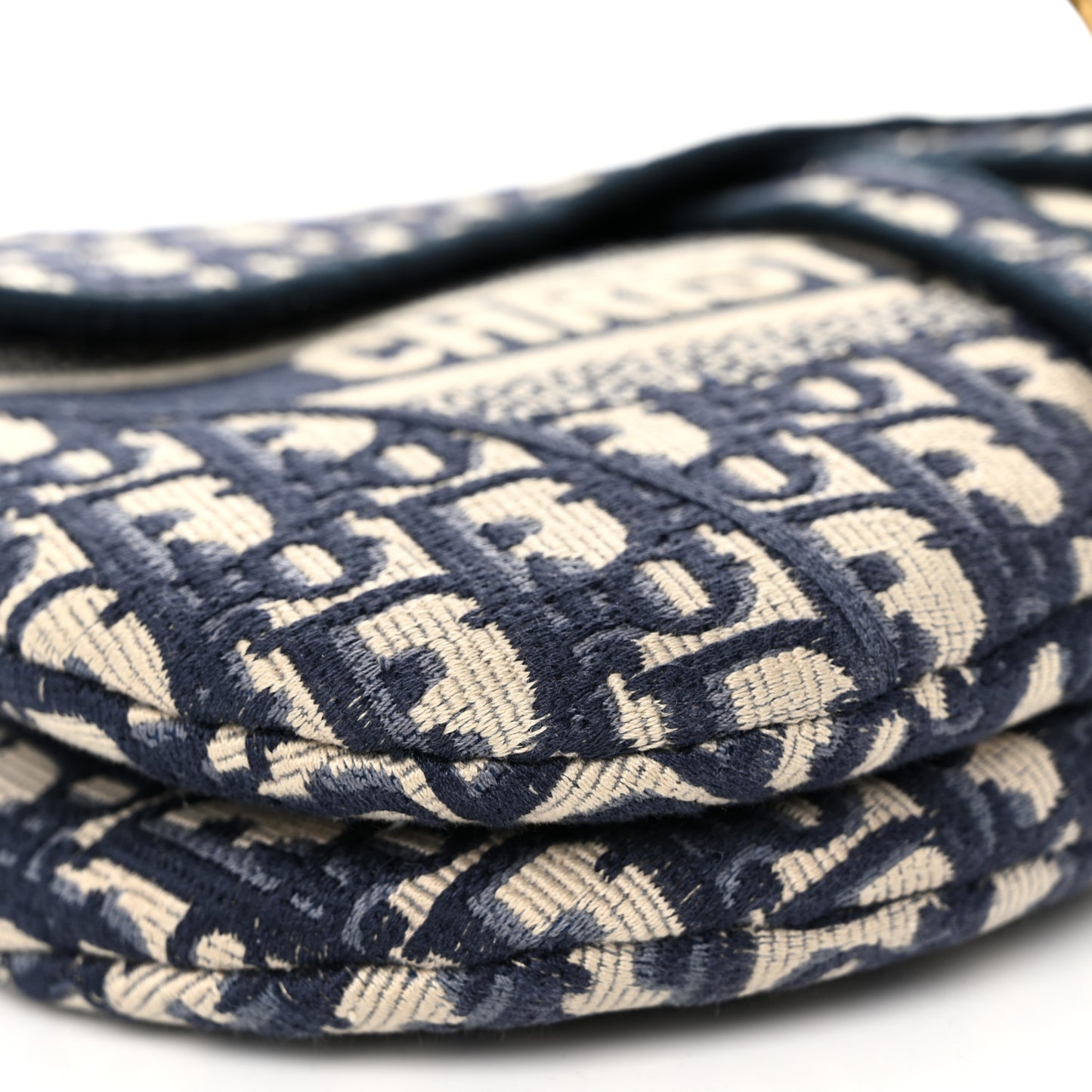Oblique Embroidered Saddle Bag Blue
