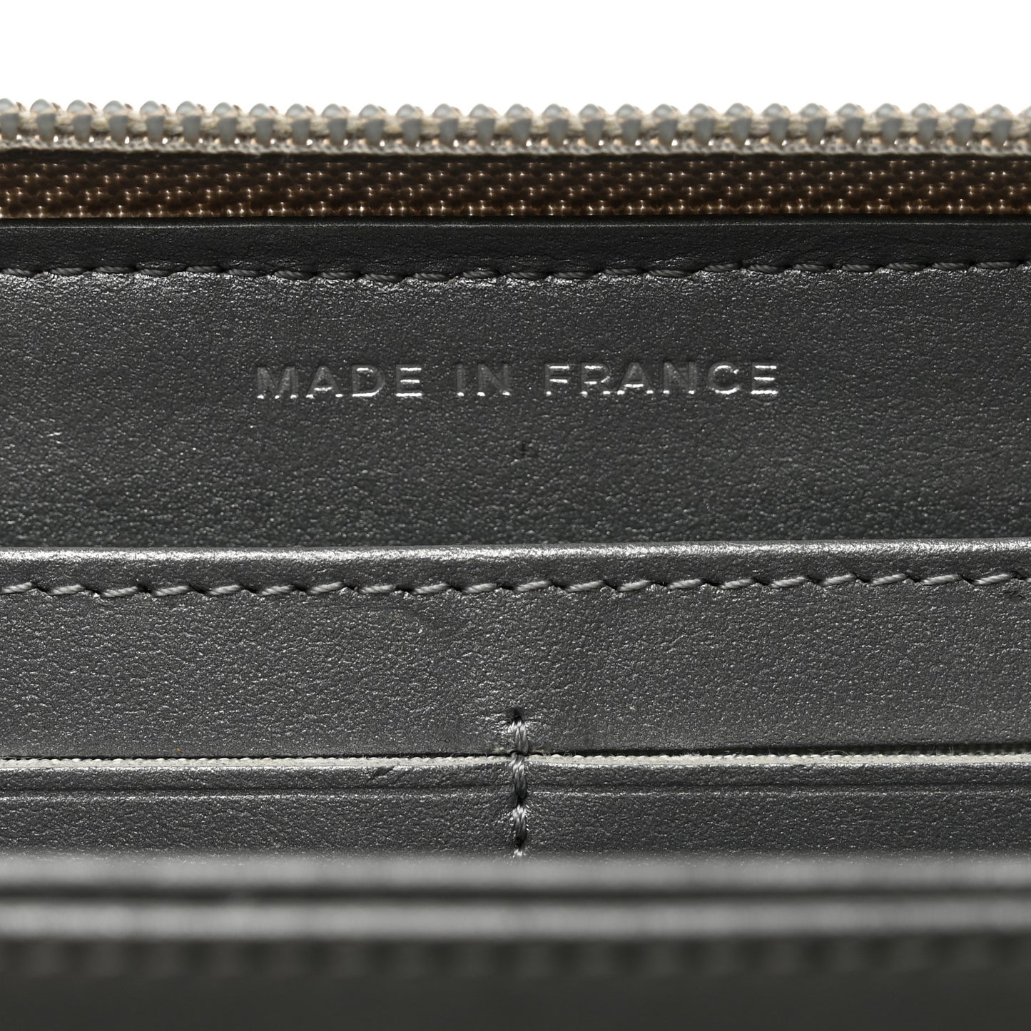 Metallic Caviar Quilted Boy Zip Around Wallet Silver