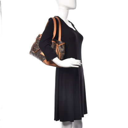 Louis Vuitton Monogram Riveting 2 of 15