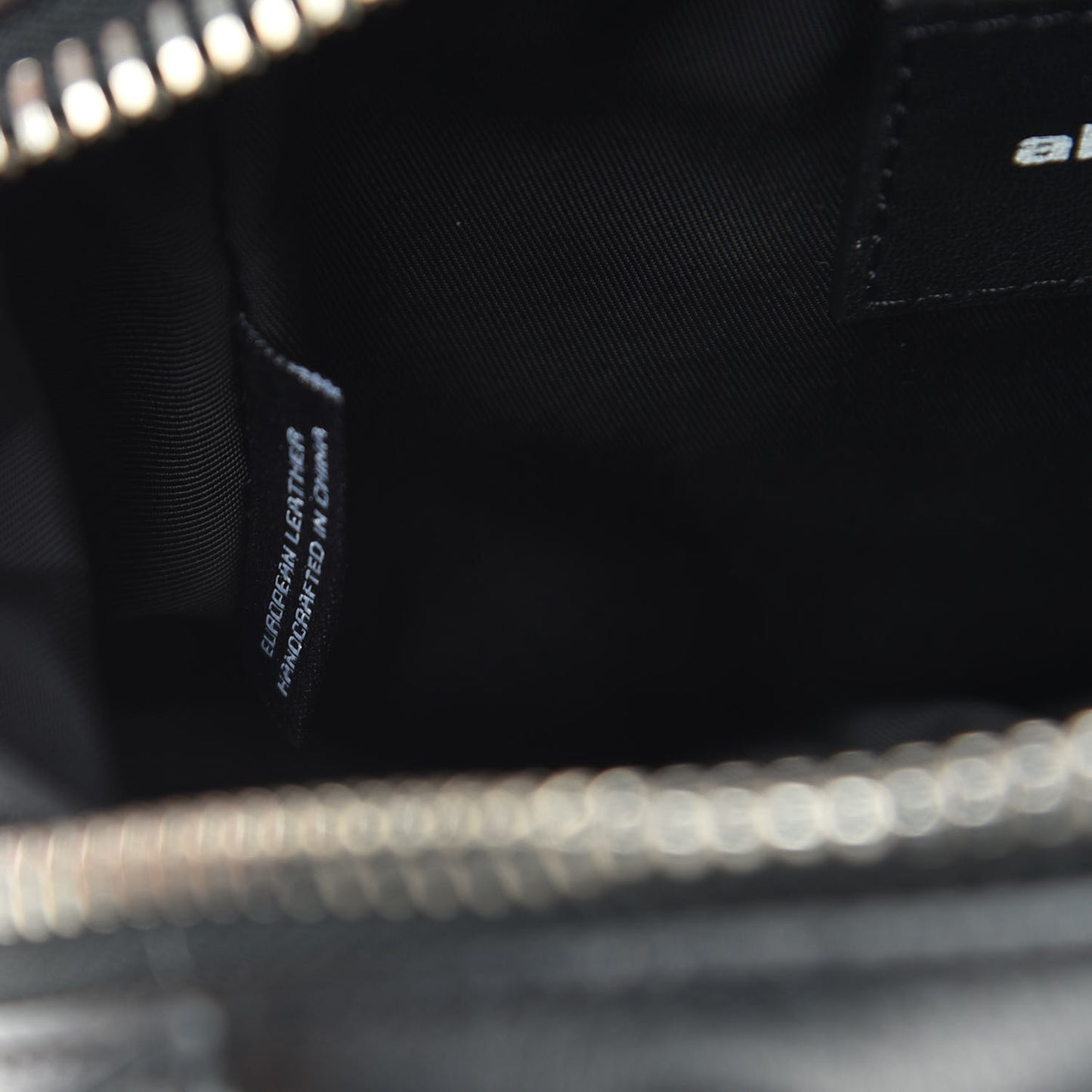 Supple Calfskin Halo Top Handle Bag Black