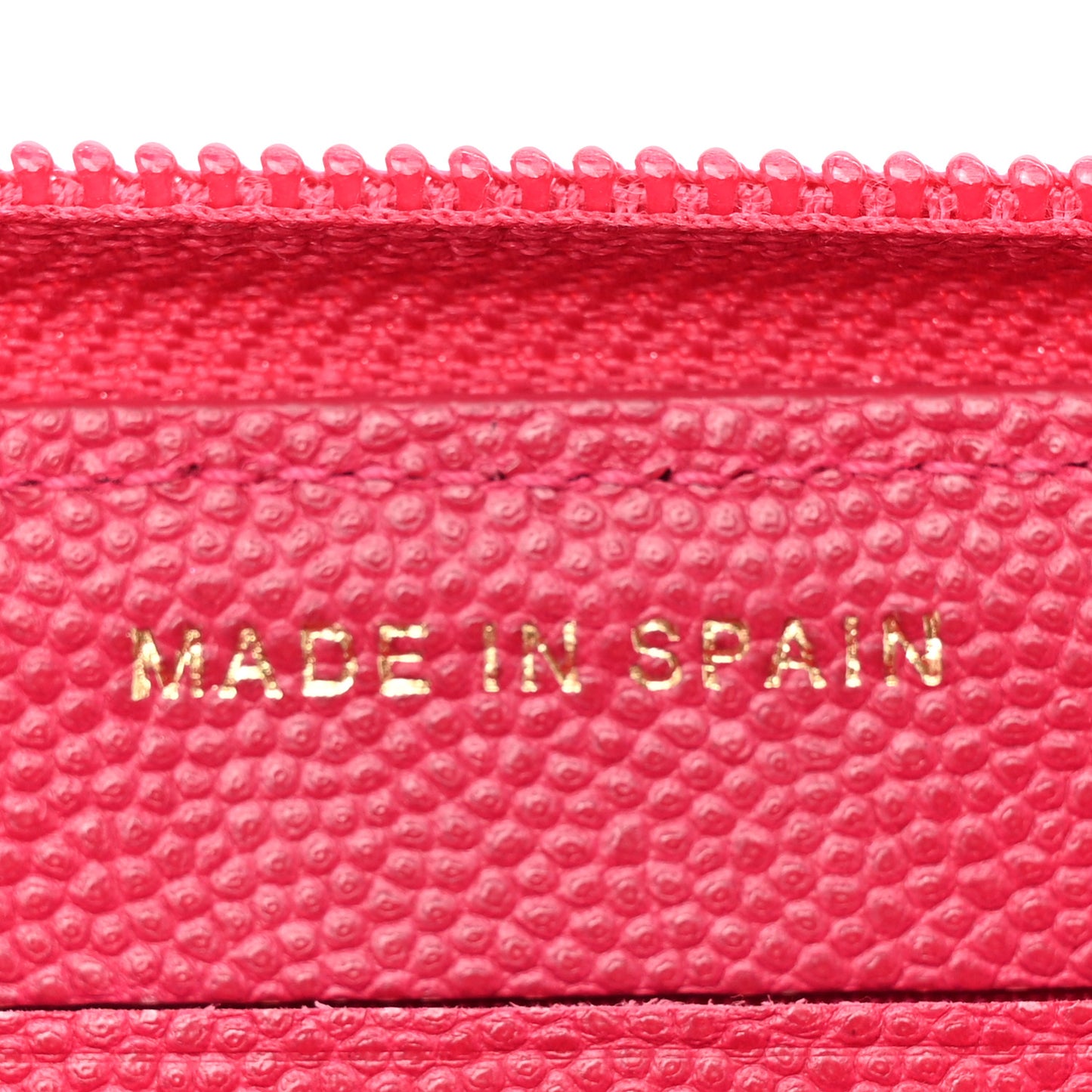 Caviar Quilted Small Boy Zip Around Wallet Fuchsia