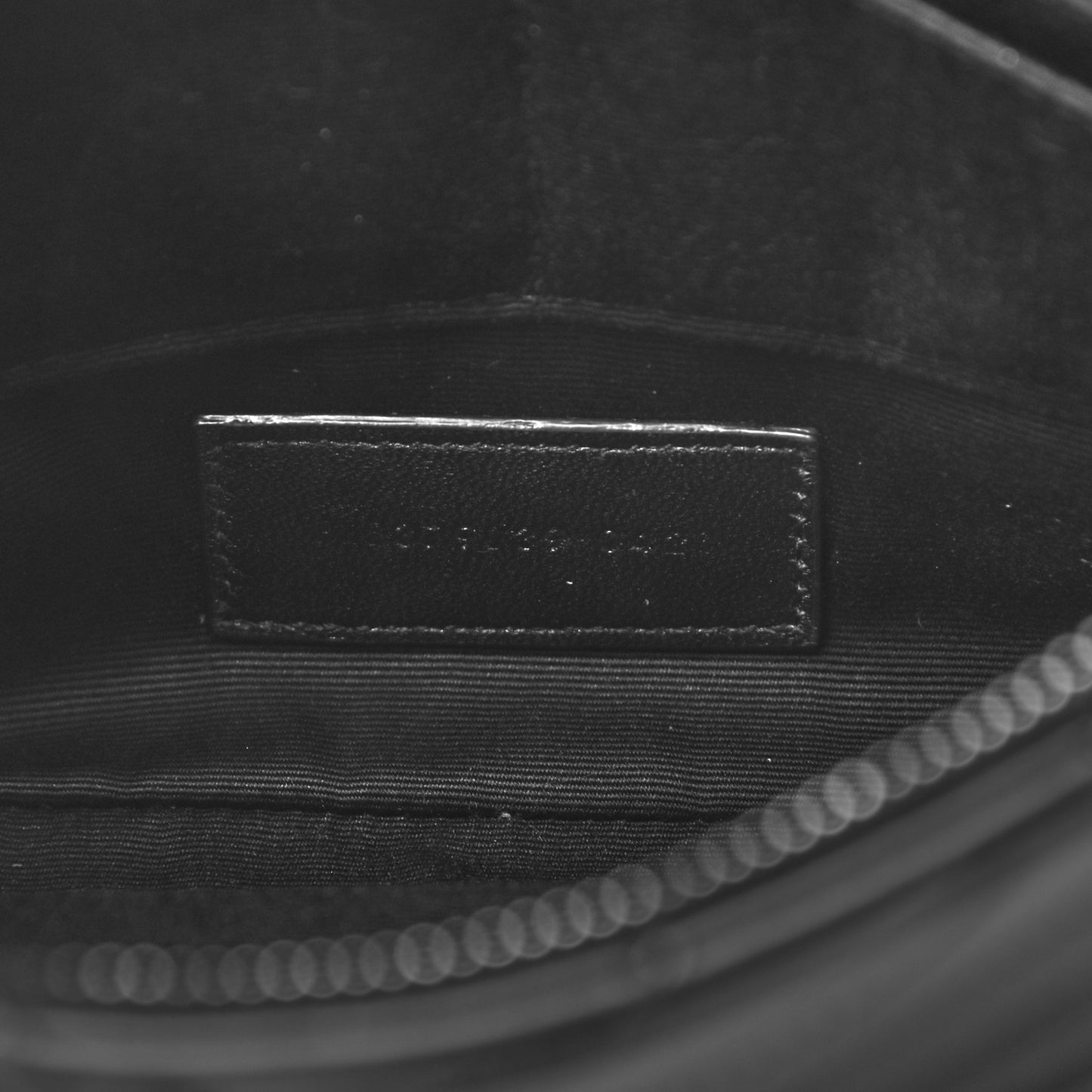 Calfskin Matelasse Chevron Monogram A5 Wristlet Black