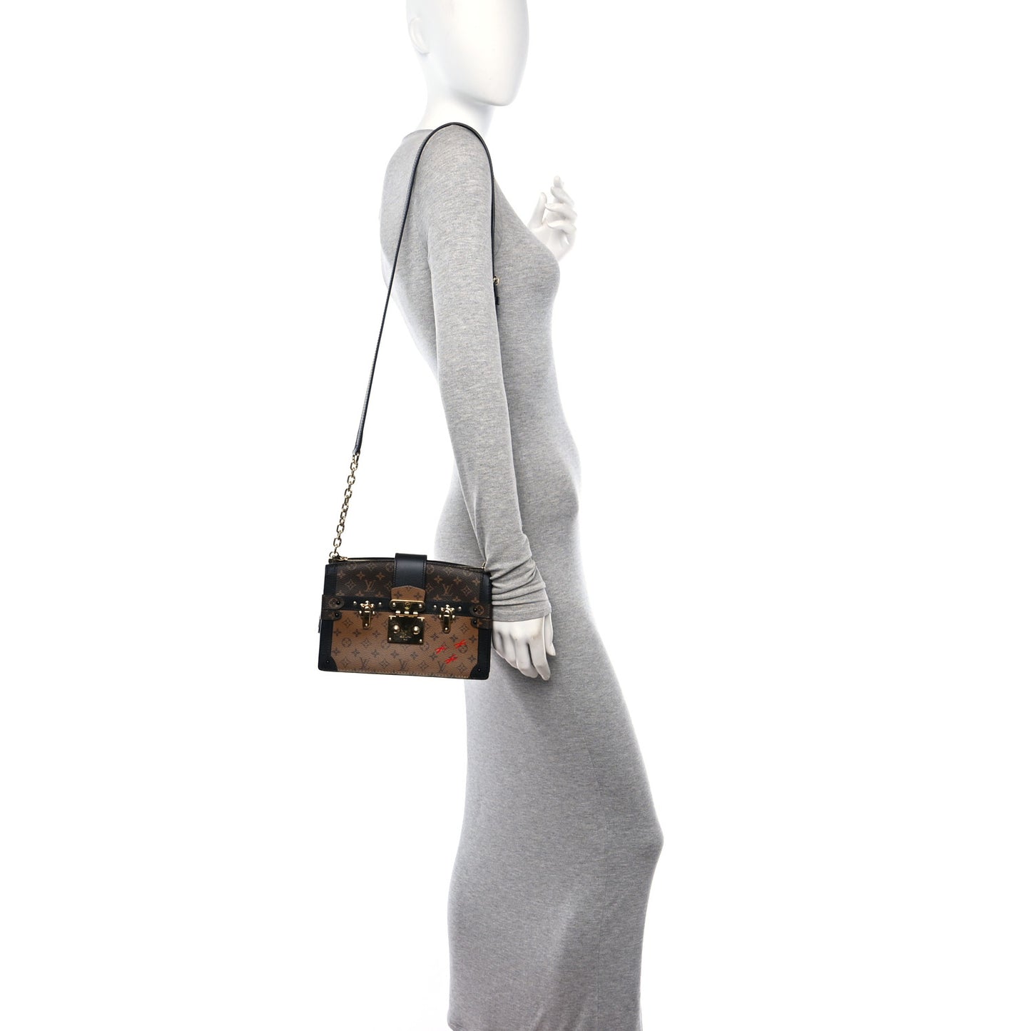 Reverse Monogram Trunk Clutch