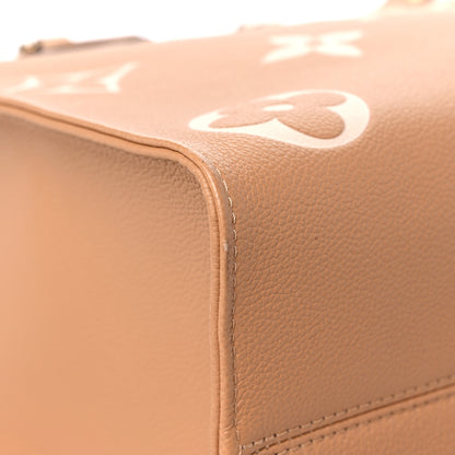 Louis Vuitton Empreinte Monogram Giant Onthego MM Arizona Creme 6 of 9