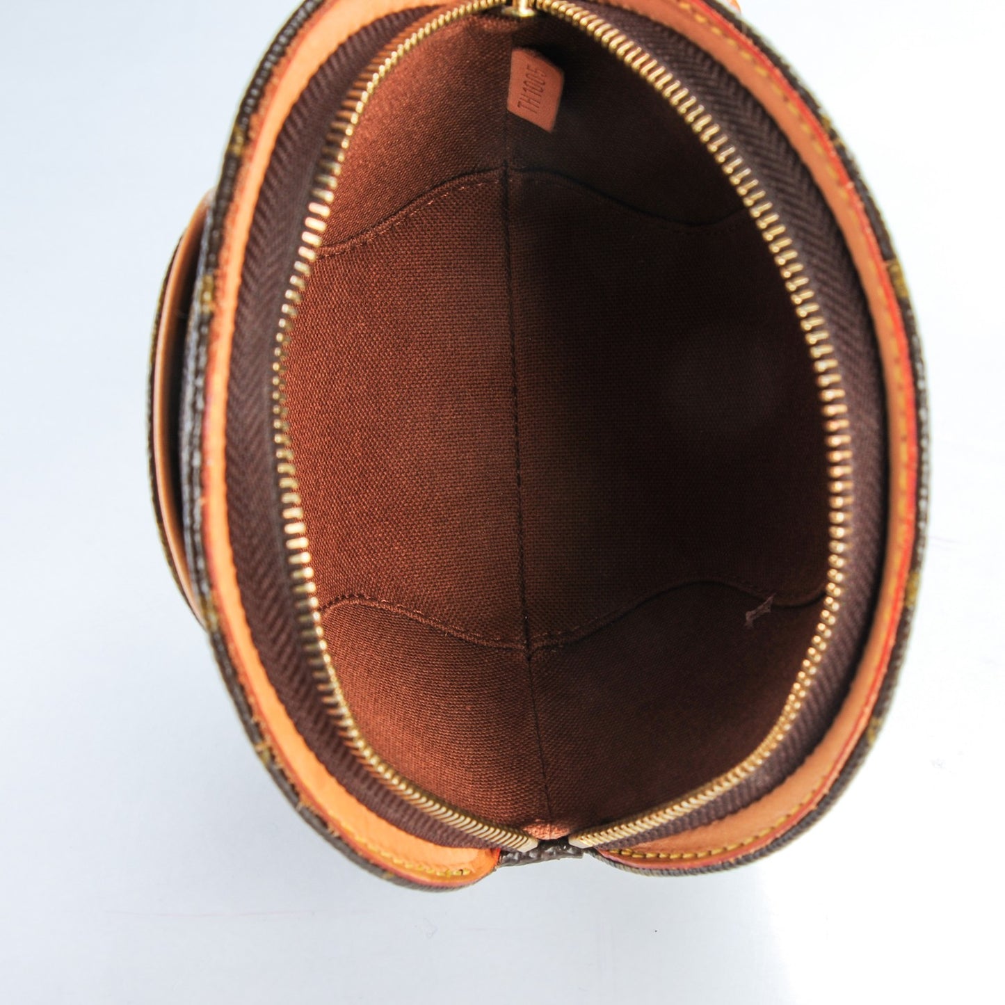 Monogram Mini Ellipse Wristlet Clutch