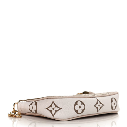 Louis Vuitton Empreinte Spring in the City Mini Pochette Accessories Kaki Beige Cream 3 of 8