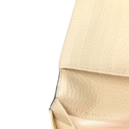 Valentino Garavani Pebbled Calfskin Rockstud Compact Zip Around Wallet Light Ivory 7 of 7