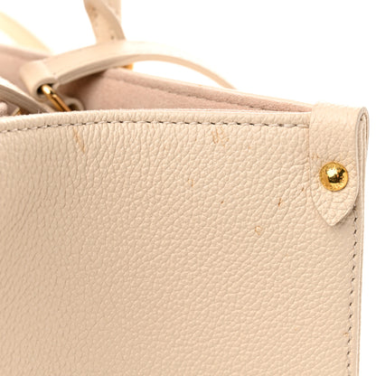 Louis Vuitton Empreinte Monogram Giant Onthego MM Creme Rose Trianon 12 of 14