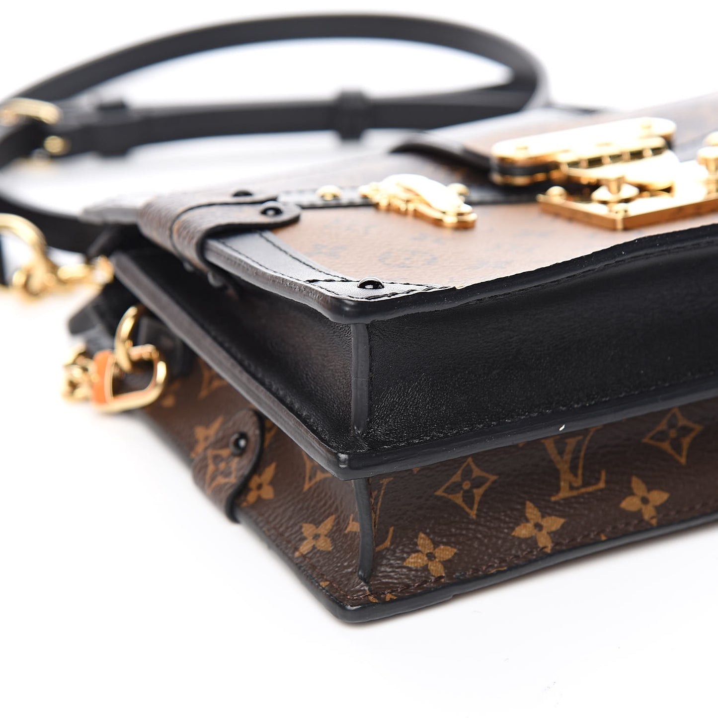 Reverse Monogram Trunk Clutch