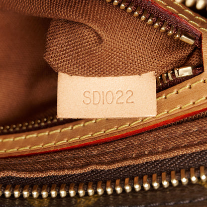 Louis Vuitton Monogram Trotteur 7 of 10