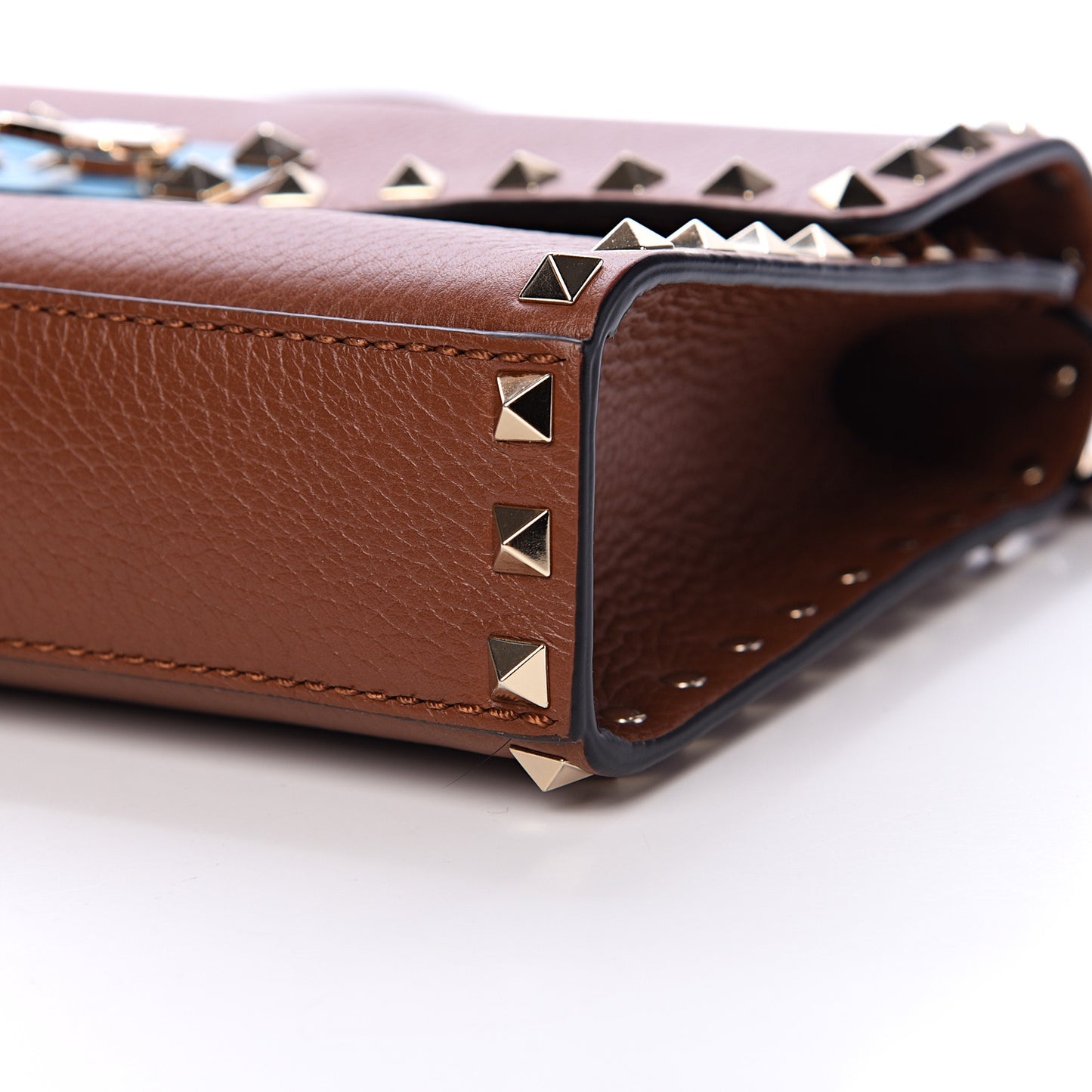 Pebbled Calfskin Medium Rockstud Flip Lock Crossbody Bag Saddle Brown