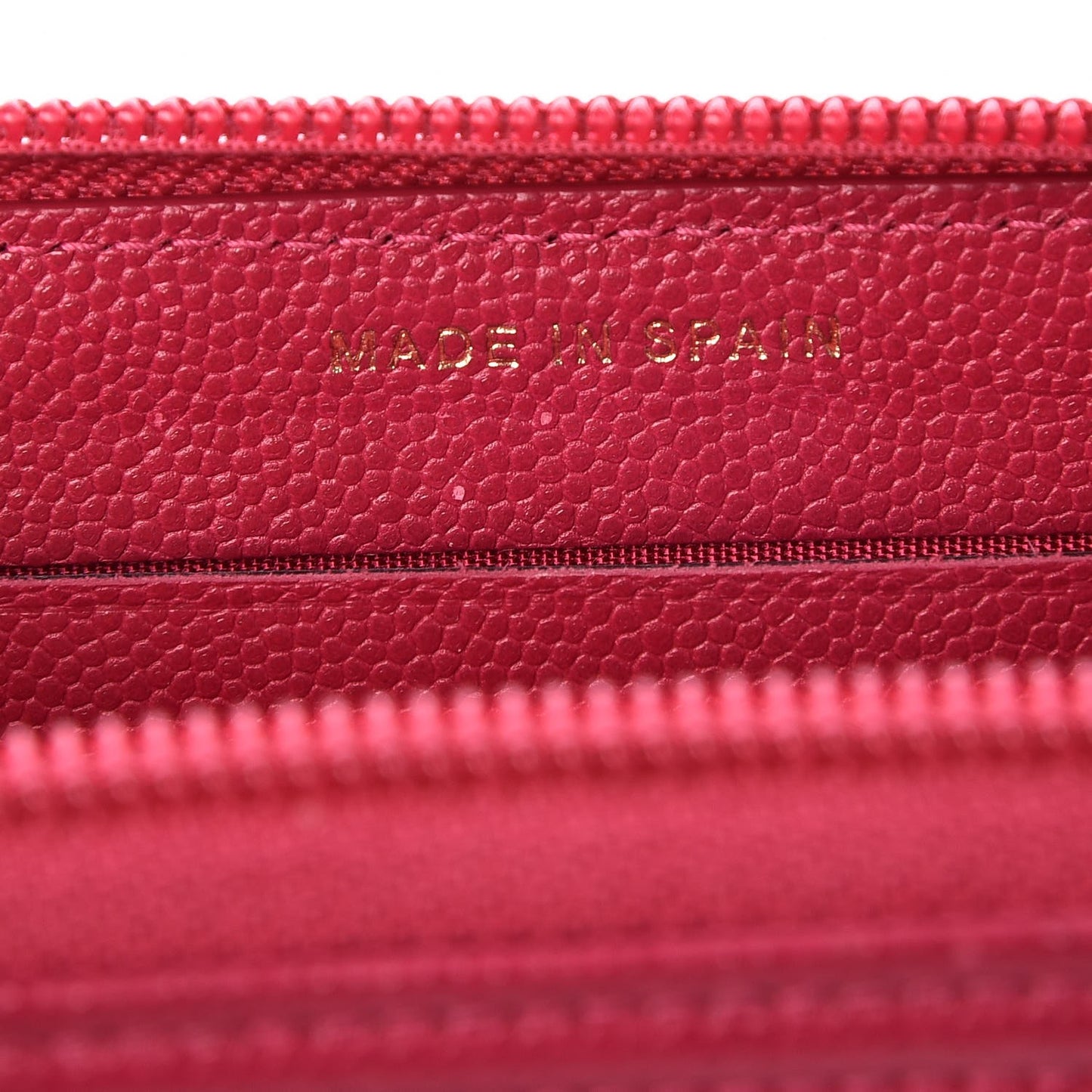 Caviar Quilted Small Boy Zip Around Wallet Fuchsia