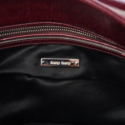 Miu Miu Vitello Shine Clutch Amaranto 7 of 16